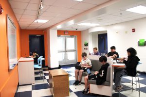 students work on project together in collaboration space