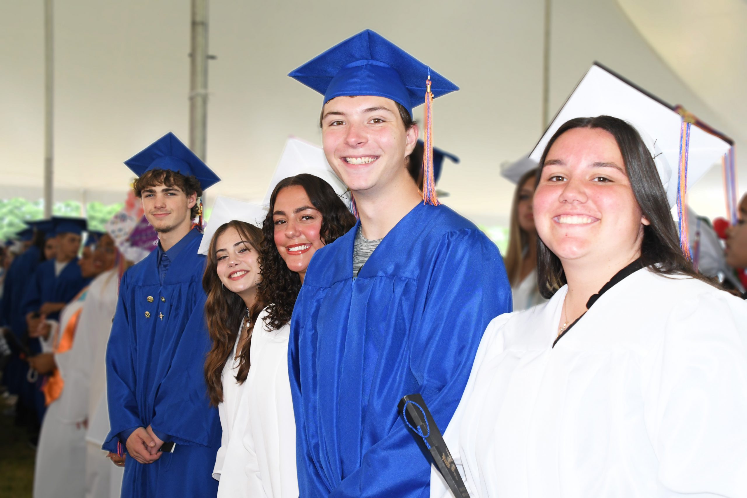 Students process into graduation