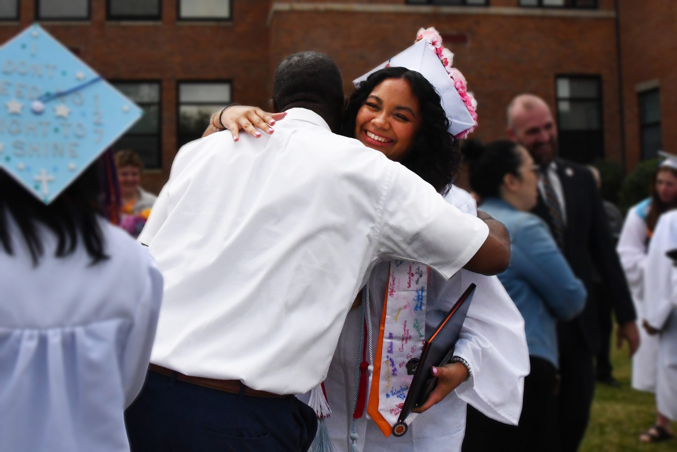 hugs after graduation