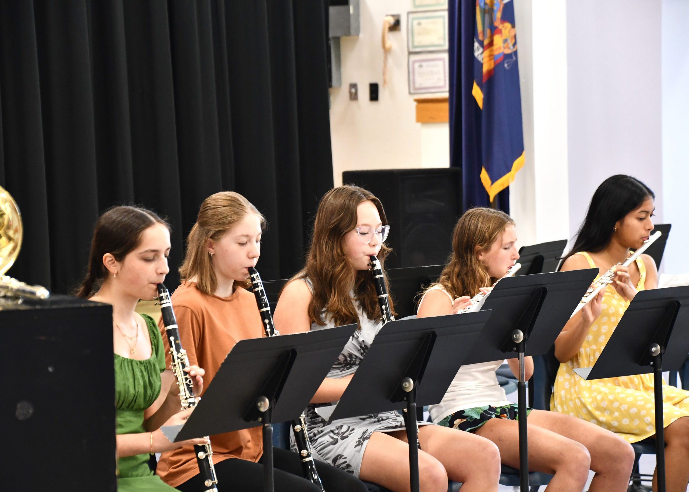 High school woodwinds play at summer band concert