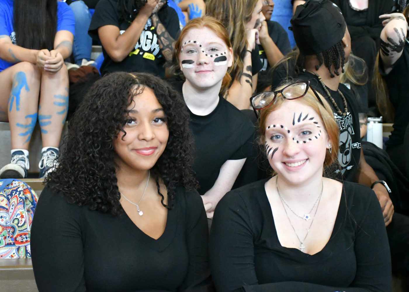 Students dressed in their class color smile for the camera