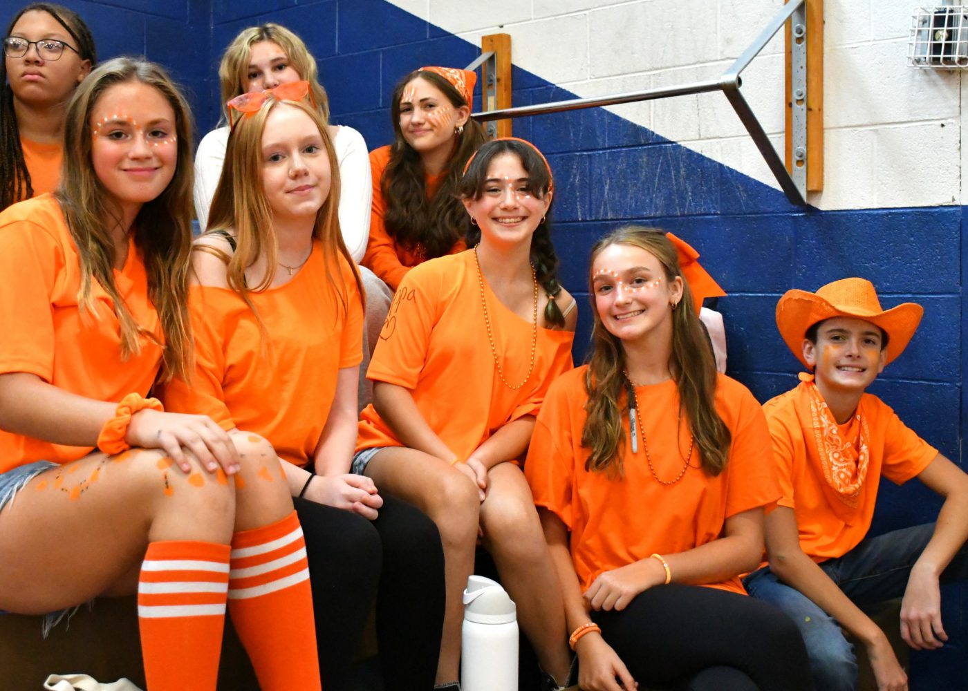 Students dressed in their class color smile for the camera