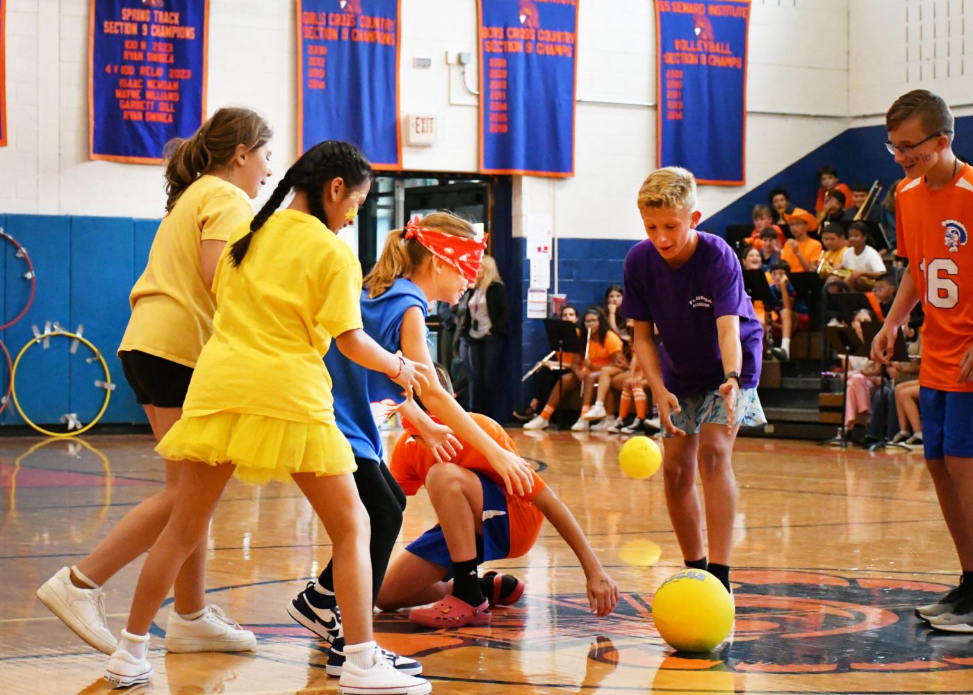 students lead blindfolded teammates toward the ball during tank commander