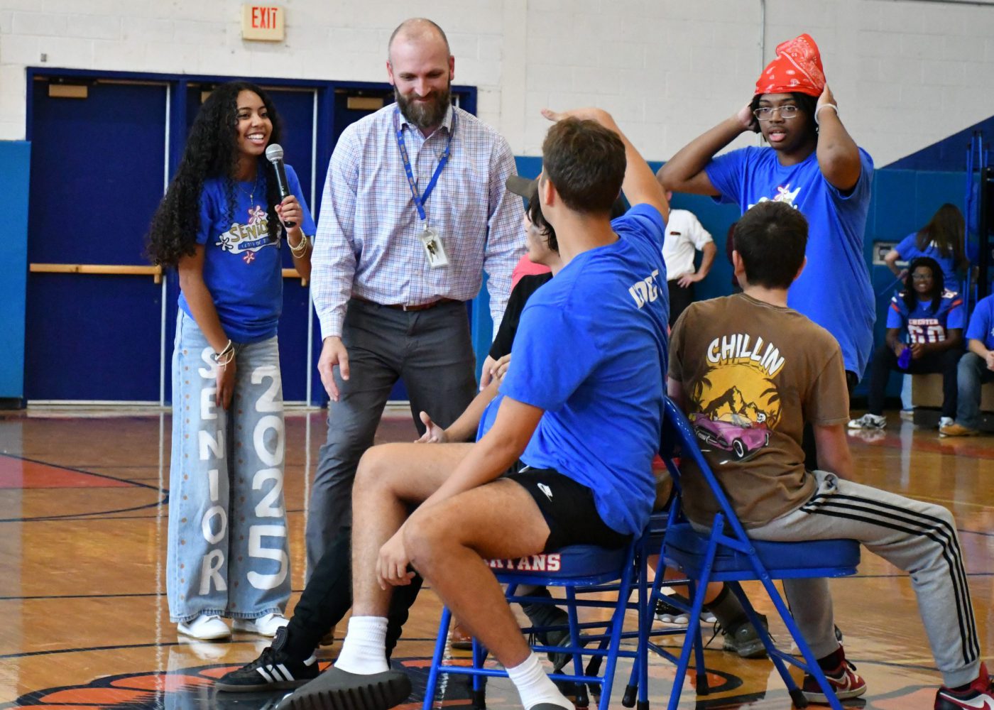 students play musical chairs