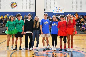 eight students are announced as the homecoming court, they pose for a photo together