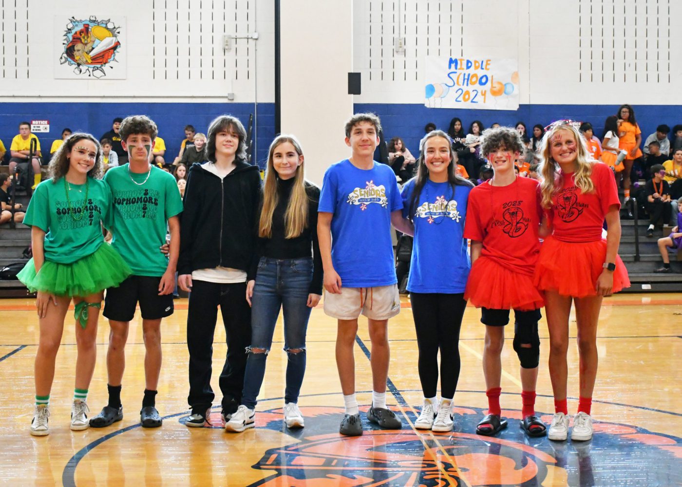 eight students are announced as the homecoming court, they pose for a photo together