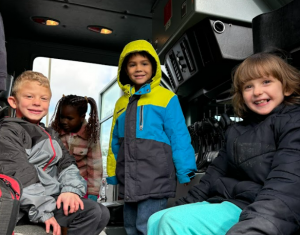 Students smile during fire prevention week