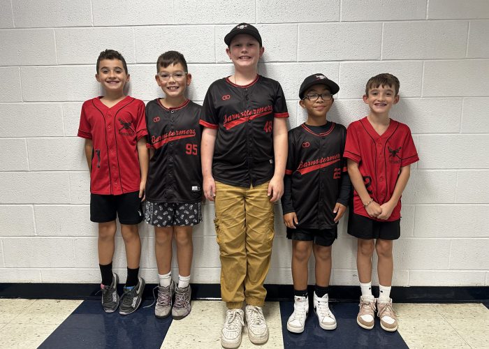 students pose for a photo on twin day