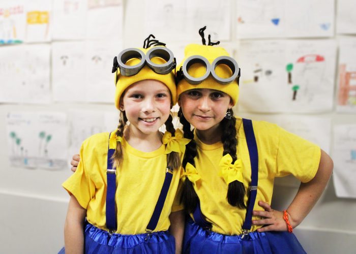 students dressed as minions for costume parade