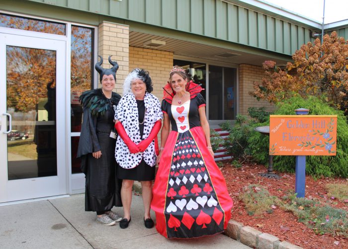 School administration dressed as Maleficent, Cruella and the Queen of Hearts