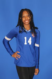 Saniya Walker smiles for the camera in her volleyball uniform