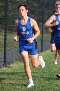 James Walsh runs in a race