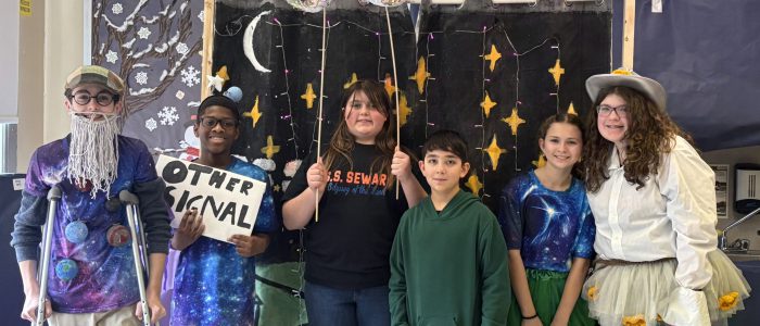 Students pose in odyssey of the mind costumes