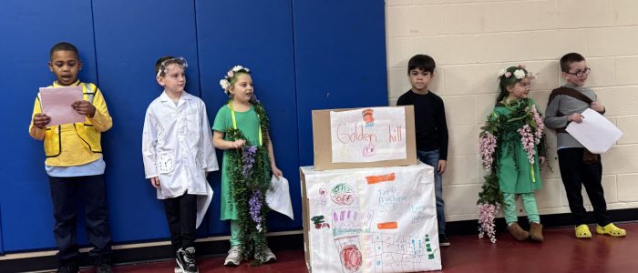 Students performing at Odyssey of the Mind Tournament