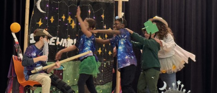 Students performing at Odyssey of the Mind Tournament