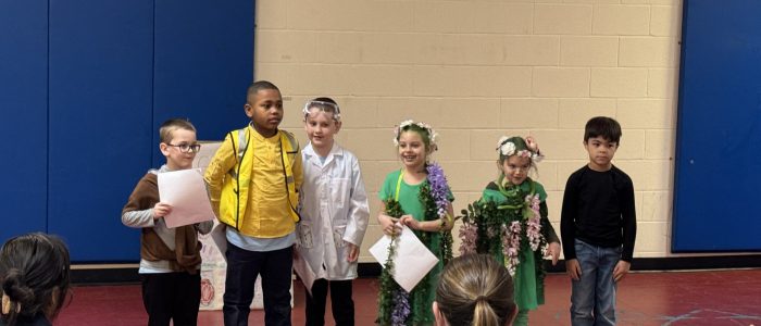 Students performing at Odyssey of the Mind Tournament